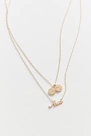 She started star sign style to gather together all things beautiful and celestial in a honey pot of wonder. Zodiac Layering Charm Necklace Set Necklace Set Urban Outfitters Necklace Charm Necklace