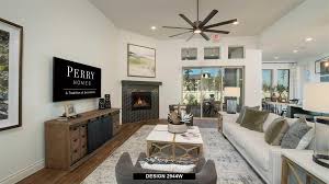 Amazing master bath with a centered garden tub and his and her vanities. Perry Homes Gallery Of Family Room Designs
