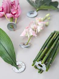 How to make silk flowers float in water. You Have To Learn Our Easy Trick For Submerging Flowers In Water
