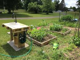 If you have the boards and steel, you can construct your own outdoor kitchen without spending anything and then just add an off the shelf grill and maybe a small dorm fridge. Diy Outdoor Sink 11 Creative And Functional Garden Sink
