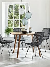 Made From Handcrafted Natural Oak Our Elegant Round Table Has Slender Legs And A Beautiful Unique Finish Wit Rattan Dining Chairs Oak Dining Table Oak Table