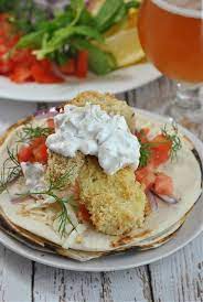 Crisp breaded fish fillets served on tortillas topped with tzatziki sauce made with greek yogurt, cucumbers and fresh herbs. Tzatziki Fish Tacos Weekly Menu Prevention Rd