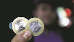 coin's 'genuineness' questioned; fate changed?