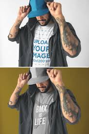 Download Placeit Middle Aged Tattooed Man With A Hat Wearing A Round Neck Tee Mockup And A Hoodie Round Neck Tees Clothing Mockup How To Wear