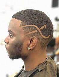 Black men haircuts are synonymous with shaved designs and shaved parts. Black Fade Haircut Designs