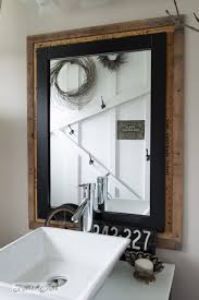 Pallet wood bathroom shaving shelf. Salvaged Farmhouse Bathroom Makeover With Vintage Trim
