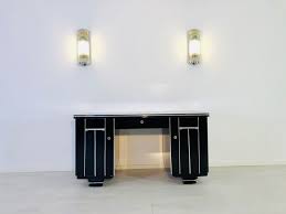 Zwei rechteckige korpusse mit tür, dahinter jeweils vier schubladen. Art Deco Schreibtisch Catawiki