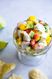 Spread spicy mayo onto tostadas, then add ceviche. Pineapple And Mango Shrimp Ceviche
