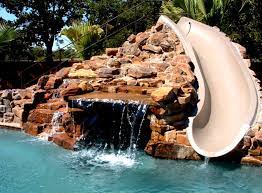 Pool slide ladders, steps, ramps, or stairs must have treads in place of rungs, if the incline angle is 15 degrees or greater. Diy Pool Slide And Waterfall Home Ideas For Your Home Fun Of Having A Diy Pool Slide Fun Of Having A Diy Pool Slide