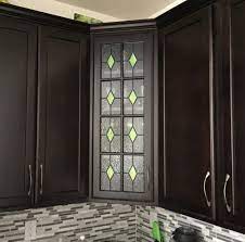 John has also created interior stained, beveled and leaded glass doors for libraries, offices, and wine cellars. Custom Stained Glass Cabinets And Windows Create A Kitchen Makeover Custom Stained Glass