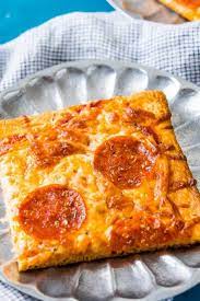 15 Unexpected Recipes You Can Make With Crescent Roll Dough Crescent Roll Pizza Crescent Dough Sheet Recipes Crescent Rolls