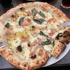 The pizza is baked on a stone floor at high temperatures. Napolitansk Pizza Picture Of Lilla Napoli Falkenberg Tripadvisor