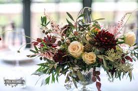 Arrangement Of Cafe Au Lait Dahlia Burgundy Dahlia Quicksand Rose Burgundy Scabiosa Chocolate Flower Arrangements Wedding Table Flowers Dahlia Centerpiece