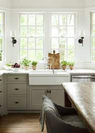 When the sun light streaming through the window it really brings out the subtle undertones of grey cabinets and the delicate white illuminating the space. The Kitchen Should Make You Smile Kitchen Dining Room Farmhouse Kitchen Cabinets Kitchen Inspirations