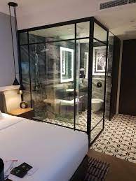 completely see through bathroom in my sos hotel room in singapore crappydesign open concept bathroom hotel room design bathroom interior design
