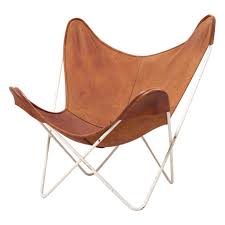 With a seat suspended from the elegantly thin, but deceptively strong jointed legs, the butterfly chair is an iconic and sought after design. Mid Century Modern Leather Butterfly Chair From Knoll International For Sale At Pamono