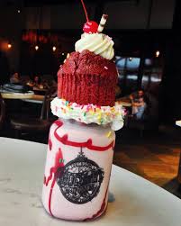 Are you a chocolate lover? Red Velvet Milkshake From Toothsome Chocolate Emporium Food Drinks Dessert Yummy Food Dessert Desserts