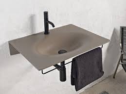 It's key feature is the integrated towel rail keeping towels close to hand and helps keep the basin area clutter free. Wall Mounted Ceramic Washbasin With Towel Rail Veil Washbasin With Towel Rail By Scarabeo Ceramiche Design Massimilian Wash Basin Towel Rail Washbasin Design