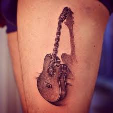 Guitar Tattoo On The Thigh Guitar Tattoo Music Tattoo Sleeves Music Tattoo Designs
