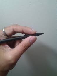 Grip the pen lightly about ⅓ of the way from the tip. Holding A Pen Correctly This Page Intentionally Left Ugly