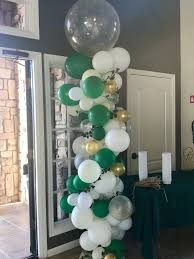 Entrance Black And Gold Balloon Arch Abstract Organic Balloon Column Balloons For Weddings Greenery Party Ideas Green Ivory An Gold Graduation Party Balloon Columns Black And Gold Balloons