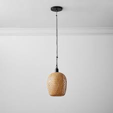 Ay illuminate's design team—ay lin heinen and nelson sepulveda—work with artisans to dream up these soulful creations. Bamboo Pendant Lighting