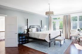 75 Primary Bedrooms With Hardwood Flooring Photos Dark Furniture Dark Bedroom Furniture Gray Bedroom Walls