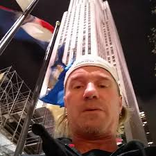 What do you use to clean glass before hockey games?