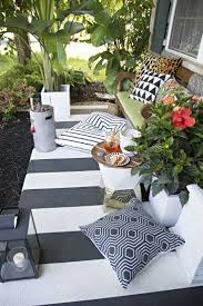 Black And White Striped Patio Decor Tropical Black And White Striped Porch Cuckoo4design Colorful Throw Pillows Colorful Throws Front Porch Decorating