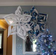 Perfect giant snowflake templates for themed parties or holiday decor! How To Make Giant Paper Snowflakes Step By Step Photo Tutorial