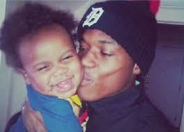 DETROIT RALLY DEMANDS CHARGES IN POLICE 'EXECUTION' OF 19-YR.-OLD DAD  TERRANCE KELLOM