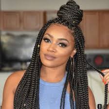 Box braids are known for their versatility. Vacation Hair Perfect Natural Hairstyles For Fun This Summer