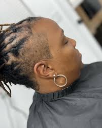 The key to cutting women's hair; 1. stay away from hard linings and 2.  having softer curves. Square hard linings tend to look very masculine.