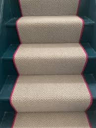 However, if it is your first time hearing stair runners, they are basically strips of carpet … Storm Grey Wool Herringbone Stair Runner With Pink Edge Stair Runner Stair Runner Carpet Carpet Stairs