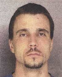 Two men charged in home robberies