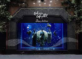 To Mark The Event La Constellation Dior At Galeries Lafayette Blue The Key Color Of The Dior Ready To Wear Autumn Wint Galeries Lafayette Window Display Dior