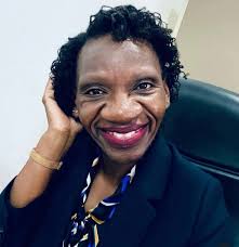 Women lawyers in minis supporting each other