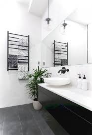 The Beauty Of A Stylish Bathroom Apartment Designed With Black White And Modern Interior 29 In 2020 Black Tile Bathrooms Black Bathroom Floor Black Bathroom