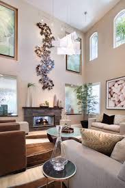 High Ceiling Rooms And Decorating Ideas For Them High Ceiling Living Room Living Room Orange Wall Decor Living Room