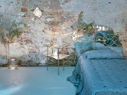 Furniture, textile, and interior designer resides in: Charlap Hyman Herrero Transformed A Venetian Mirror Workshop Into A Mythical Bedroom Garage