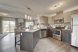 Two Toned Cabinets Grey And Brown Cabinets Thermofoil Cabinets Mdf Cabinets Grey Lamiante Flooring Granit Open Concept Kitchen Brown Cabinets Mdf Cabinets