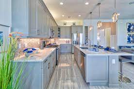 Explore a collection of kitchen carts and islands that make for efficient mobile storage that can be used in the kitchen, office or garage. Transitional Canadian Gray Shaker Kitchen Cabinets Lake Worth Fl Eurocraft Delray Akel Homes Isla