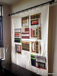 the quilting edge floppy design wall beside an open window sewing room design quilt design wall quilting room