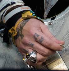John christopher depp ii (born june 9, 1963) is an american actor, producer, and musician. Johnny Depp Changes Tattoo Of Amber Heard S Nickname From Slim To Scum Stylecaster