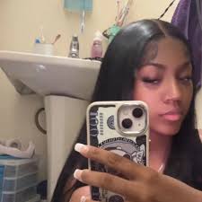 Hi, I'm Katie Fisher and I'm from Blissfield, Michigan. I am majoring in  graphic design and love art. I enjoy having adventures but also quiet  nights at home and I'm a bit