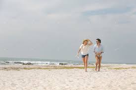 Front View Of Happy Young Caucasian Couple Running At Beach On A Sunny Day By Wavebreakmedia S Photos Ad Affiliate Young Couple Running Beach Sunny Days
