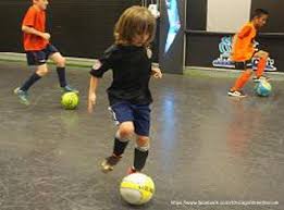 While watching soccer played on a big field, even quick passes look slow when contrasted with what happens on a futsal court. Chicago Street Soccer