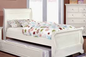 When you need to access the trundle, it simply wheels out from underneath the top! What Is A Trundle Bed Understanding This Space Saving Bed Solution