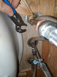 It helps to remove some. How Can I Unscrew The Faucet Nuts In The Tight Space Behind My Sink Basin Home Improvement Stack Exchange