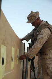 File:U.S. Marine Corps Maj. Yohannes Negga, with Headquarters Company,  Regimental Combat Team (RCT) 3, checks his target during live-fire training  at Camp Dwyer, Helmand province, Afghanistan, Aug. 21, 2009 090821-M-BO337- 005.jpg - Wikimedia